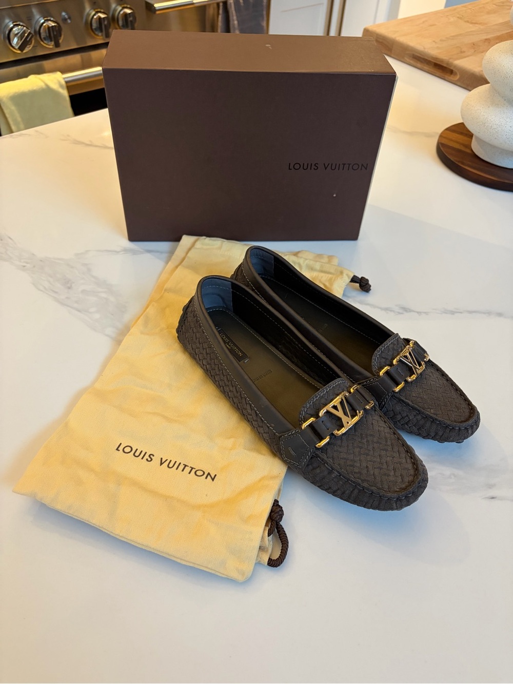 Louis Vuitton Black Woven Leather Loafers with Gold LV Buckle